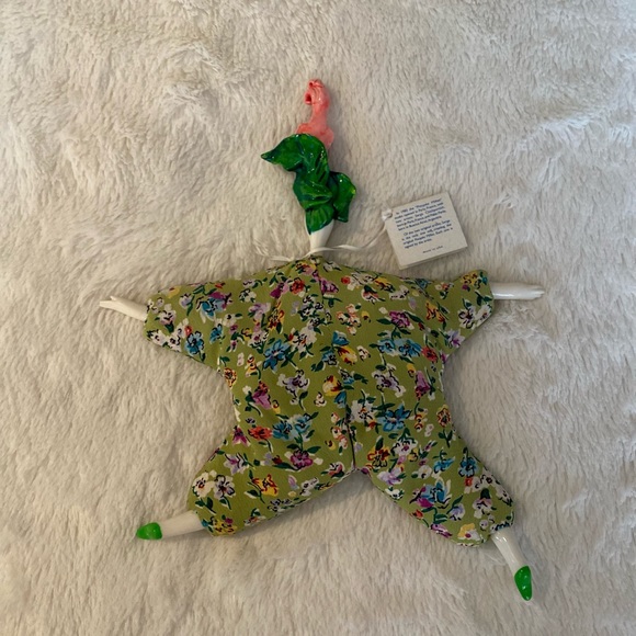 Poupee” flamingo millet doll. 4”W x 9”H. Arm reach 10-1/4”  Cir: 1997. - Picture 2 of 5